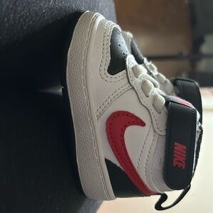 Bundle of Nike baby shoes size 2c